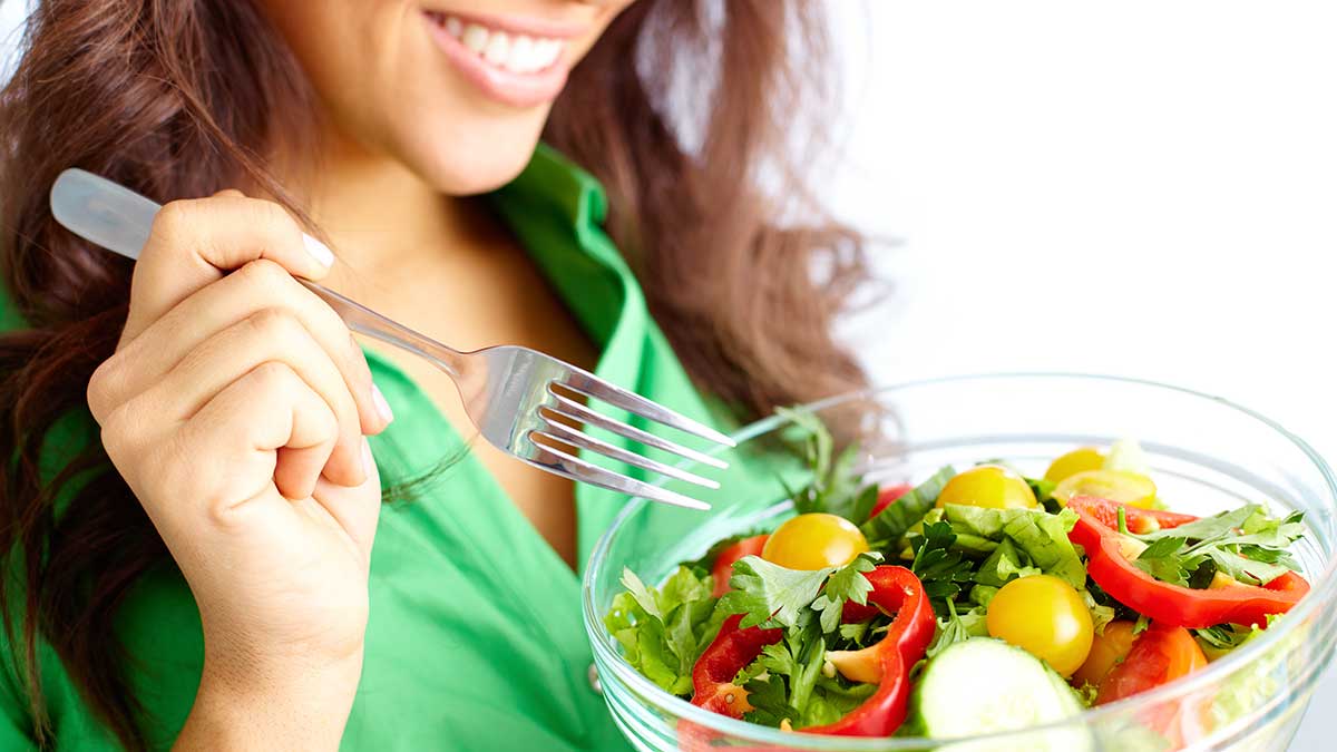 woman eating a healthy salad